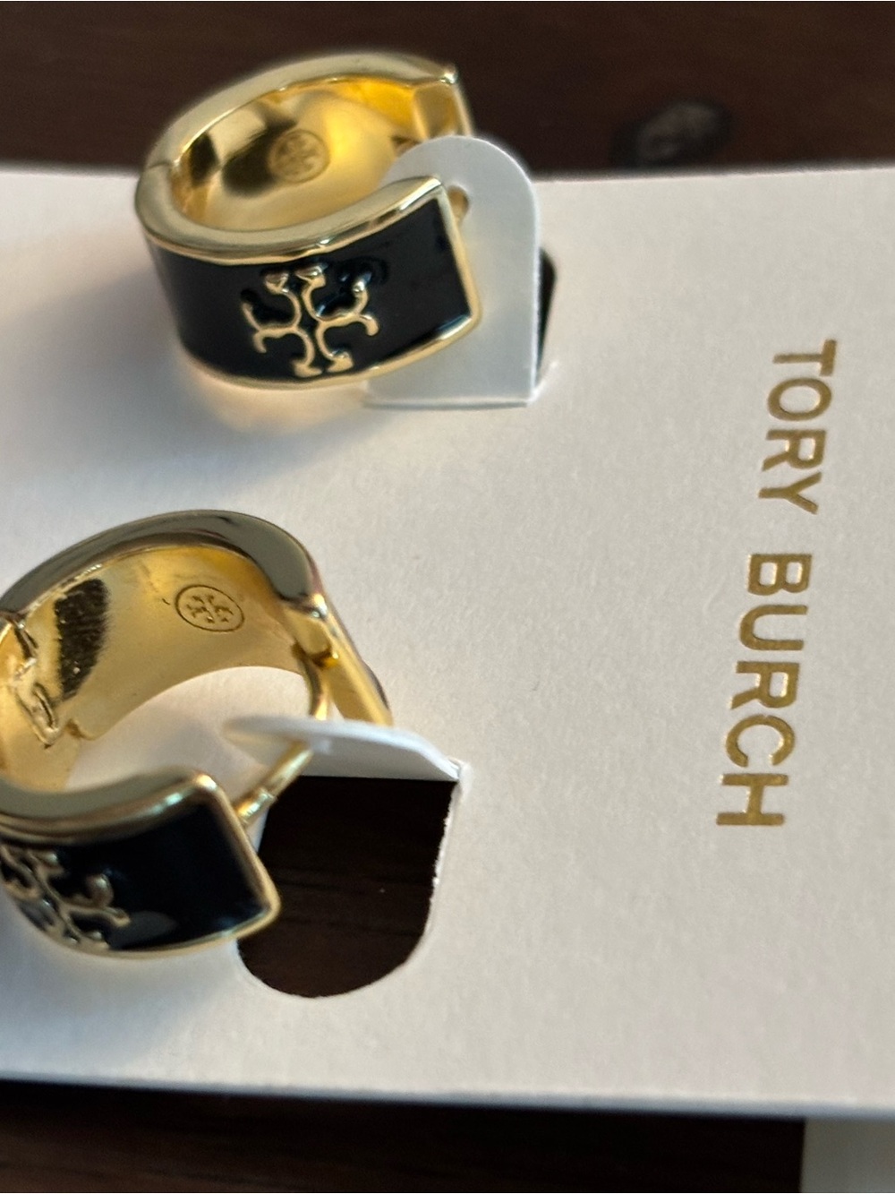 Brand new Tory Burch Gold and Black Enamel Logo Huggie Earrings